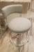 Wesley Allen's Bali Swivel Kitchen Counter Stool with Low Back in Silver