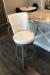 Amisco's Cardin Swivel Counter Silver Metal Stool with Arms Upholstered in White Vinyl in Transitional Kitchen