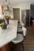 Amisco's Barry Swivel Counter Stools in Modern White Brown Kitchen