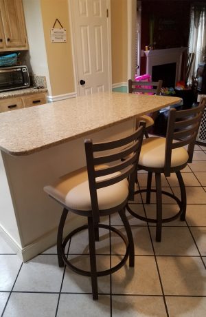 Holland's Jackie Swivel 25-26" Inch Counter Stools in Bronze Metal Finish and Sand Seat Cushion with Ladder Back Design in Traditional Kitchen