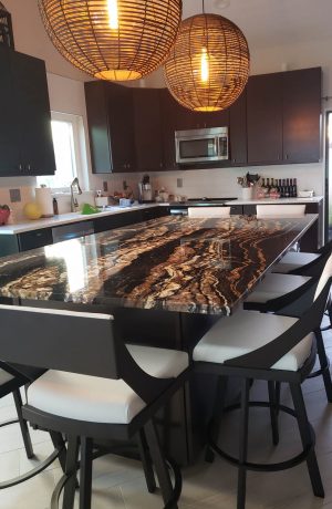 Amisco's Fame Swivel Bronze Counter Stool in White Vinyl in Customer's Modern Kitchen