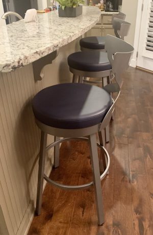 Amisco's Lincoln Modern Silver Swivel Bar Stool with Navy Vinyl in Modern Kitchen