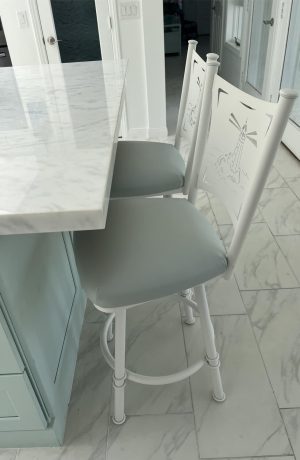 Trica's Creation Collection White Swivel Bar Stools in Seafoam Green Vinyl in Customer's Kitchen