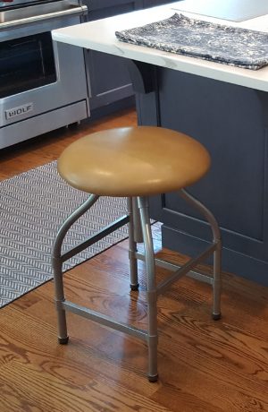 Wesley Allen's Dodge Backless Swivel Bar Stool in Aged Nickel in Modern Kitchen