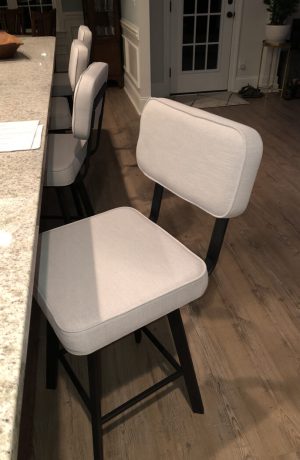 Amisco's Brixton Swivel Modern Bar Stool with Back in Black Metal Finish in Modern Kitchen