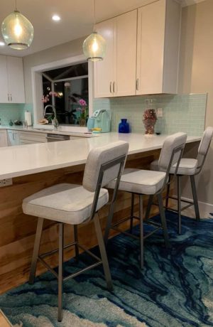 Amisco's Brixton Swivel Upholstered Counter Stools in Gray and White - In Modern Retro Kitchen