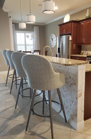 Amisco's Weston Comfortable Upholstered Swivel Bar Stool with Backs in Transitional Kitchen