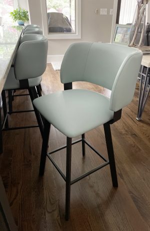 Amisco's Easton Dark Brown Swivel Counter Stool with Seafoam Green Seat and Back in Modern Kitchen