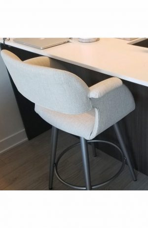 Amisco's Sorrento Swivel Counter Stool in Silver Metal Finish and Off-White Upholstery in Modern Kitchen