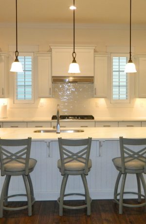 Holland's Catalina 820 Swivel Nickel Bar Stools with Cross Back Design in Modern White Kitchen