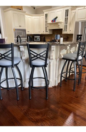 Holland's Catalina Pewter Swivel Spectator Height Stools in Customer's Traditional Kitchen