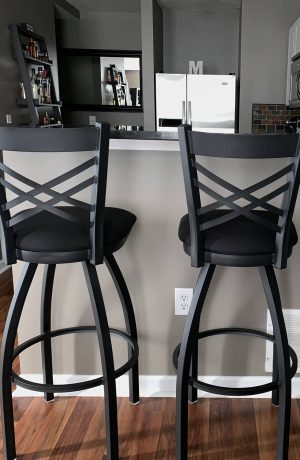 Holland's Extra Tall Black Swivel Barstools with Back, Featured in Customer's Modern Black and White Kitchen