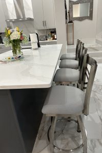 Holland's Catalina Stainless Steel Swivel Bar Stools in Modern White Kitchen