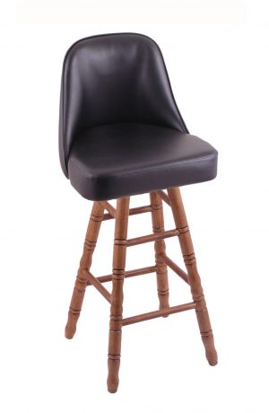 Holland's Grizzly Hardwood Upholstered Swivel Bar Stool with Turned Legs in Medium, oak wood finish, and Black vinyl seat and back