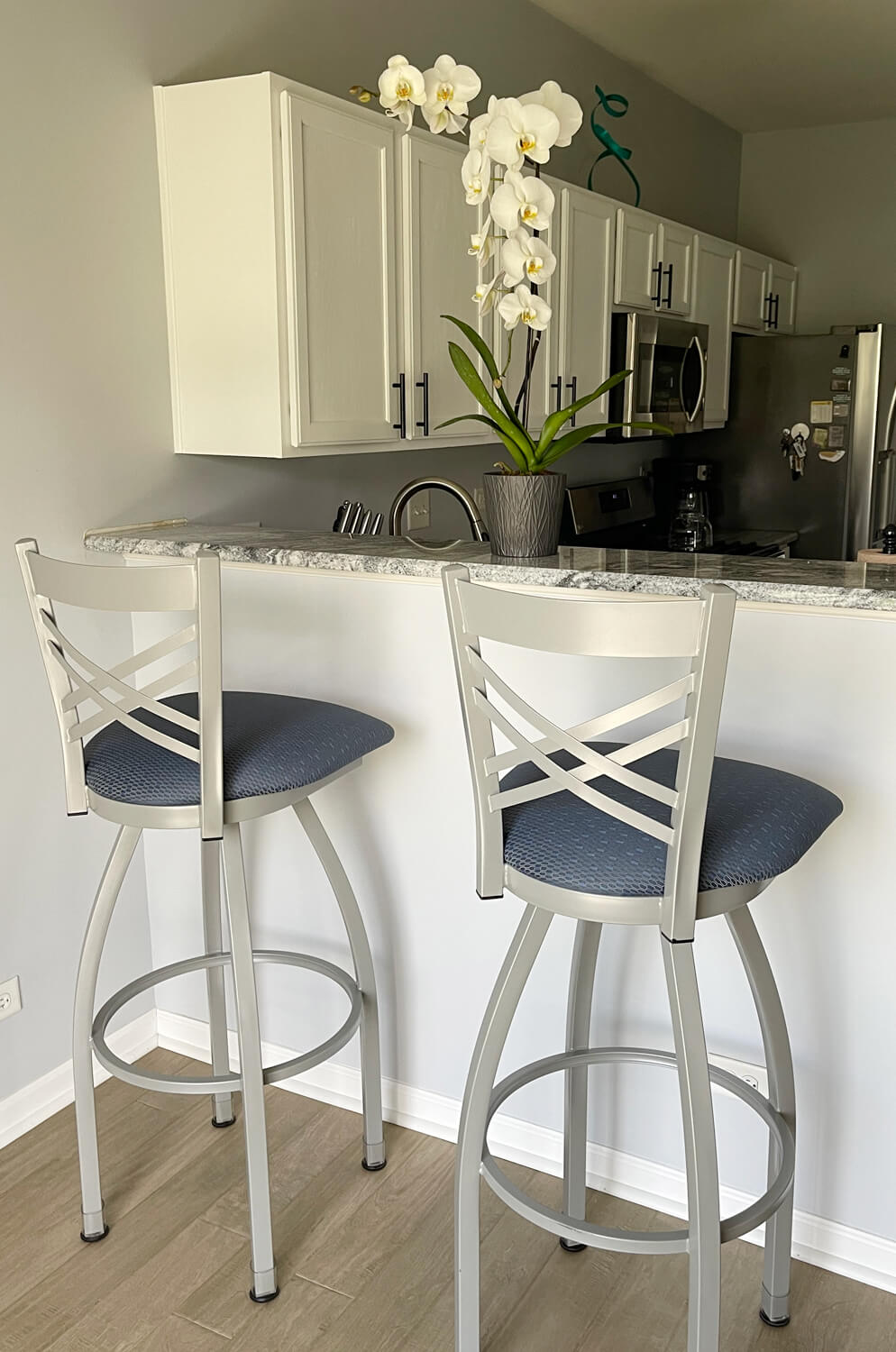 Holland's Catalina 820 XL Silver Metal Swivel Bar Stool with Low Back in Customer's Kitchen