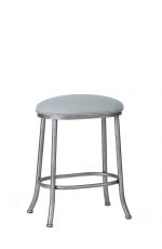 Wesley Allen's Canton Backless Oval Stool shown in Silver Bisque metal and Vinyl seat cushion