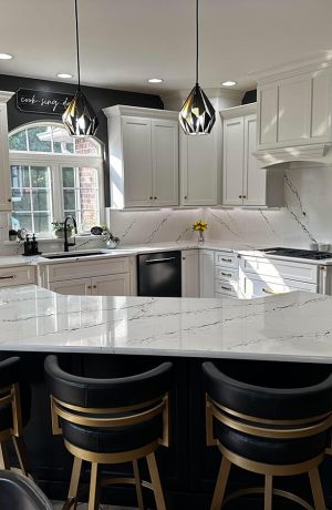 Wesley Allen's Miramar Gold Swivel Bar Stools in Black Vinyl in Modern Black and White Kitchen