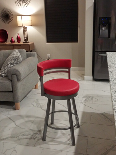 Amisco's Ronny Swivel Bar Stool in 24 Magnetite metal finish and Red seat and back cushion in Modern Kitchen