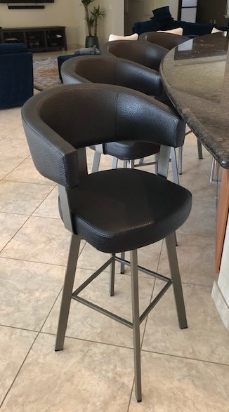 Amisco's Grissom Upholstered Swivel Bar Stools with Curved Back in Gray Metal Finish and Black Cushion