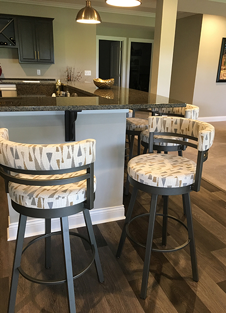Amisco's Ronny Swivel Bar Stools in 73 Mineral Gray Metal Finish and CR Arrowhead Upholstered Pattern in Modern Kitchen