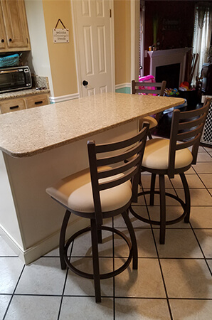 Holland's Jackie Swivel Counter Stools in Traditional Brown/Tan Kitchen with Tile Flooring and Kitchen Island