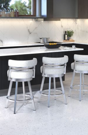 Wesley Allen's Miramar Brushed Stainless Swivel Barstools with Low Back in Black and White Kitchen