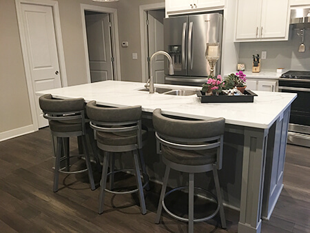 Monochromatic kitchen with pops of color