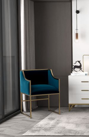 Wesley Allen's MILA Modern Arm Chair in Blue and Gold in Bedroom