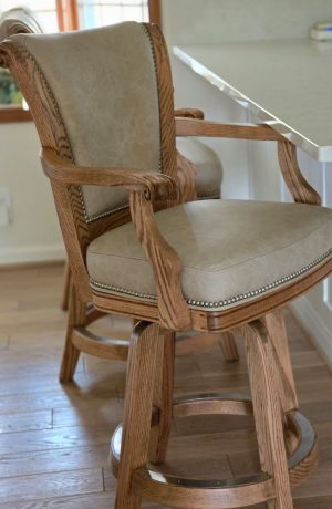 Darafeev's Classic Honey Oak Swivel Bar Stool in Leather and Nailhead Trim - In Kitchen