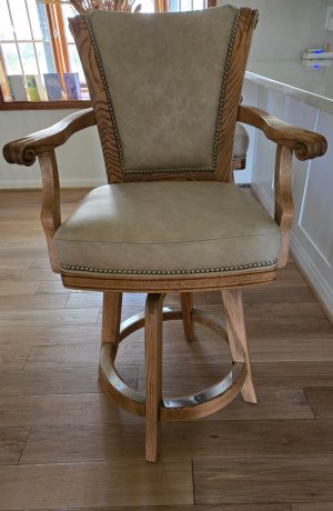Darafeev's Classic Honey Oak Swivel Bar Stool with Arms in Leather and Nailhead Trim - In Kitchen