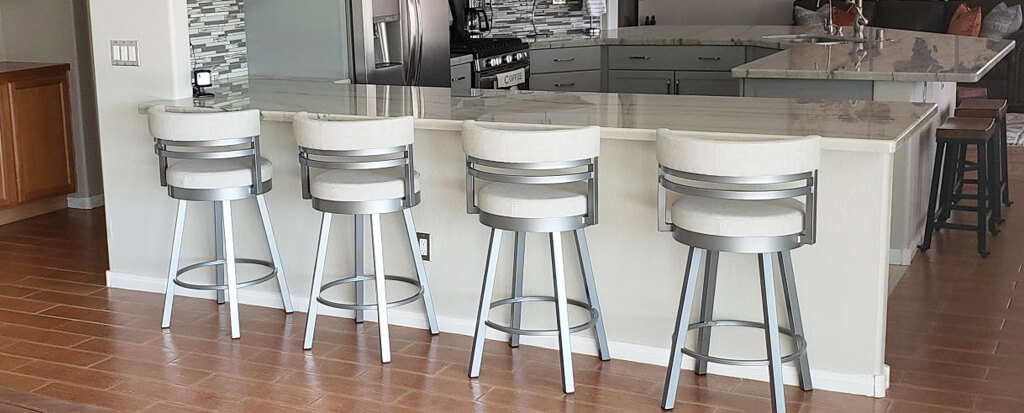 Featuring the Ronny bar stools by Amisco