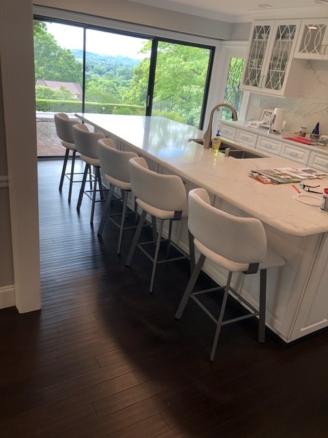 Amisco's Easton Swivel Bar Stools in Modern White and Silver Kitchen