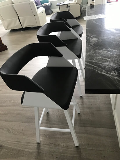 Amisco's Stacy Modern Swivel Bar Stools with Arms in White Metal Finish and Black Upholstery