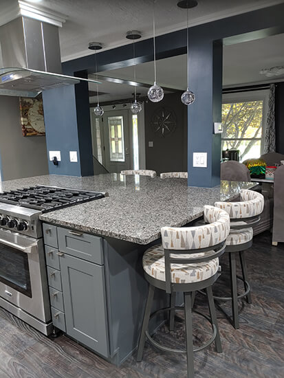 Amisco's Ronny Swivel Counter Stools in Arrowhead Pattern fabric and Gray Metal Finish in Modern Kitchen