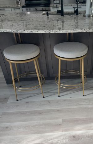 Amisco's Glenn Gold Backless Swivel Counter Stools at the Kitchen Island