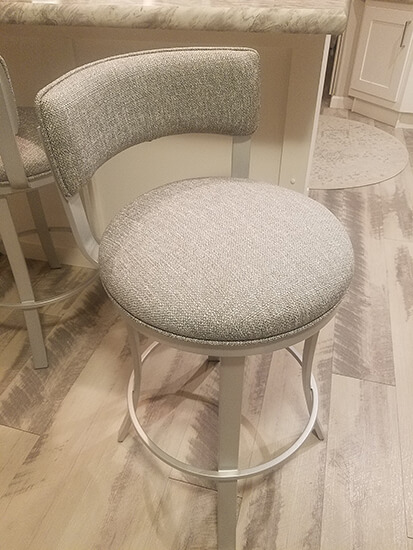 Wesley Allen's Bali Swivel Counter Stool in Light Silver Metal and Light Fabric - with Low Back