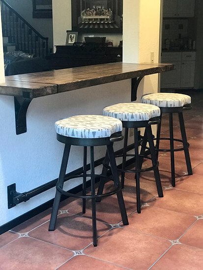 Amisco's Bryce Backless Black Swivel Bar Stool in Kitchen Bar