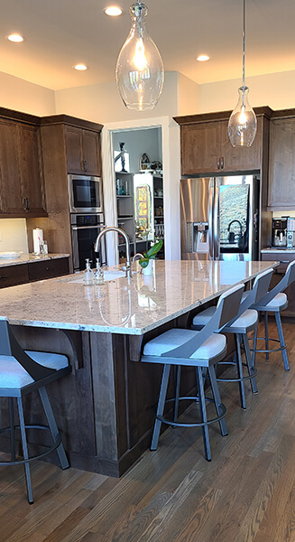 Amisco's Fame Modern Swivel Bar Stools in Dark Gray Metal and Gray Fabric in Modern Kitchen