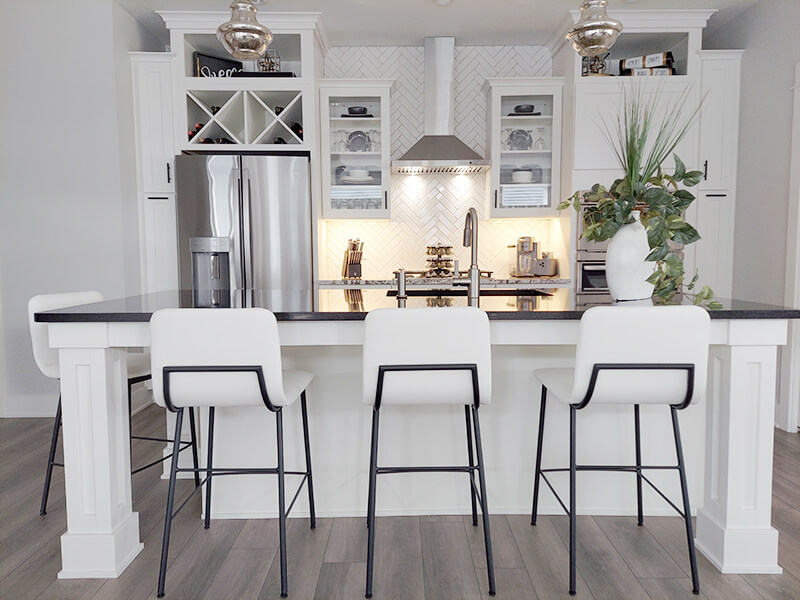 Amisco's Outback Low Back Black and White Bar Stools in Modern Kitchen