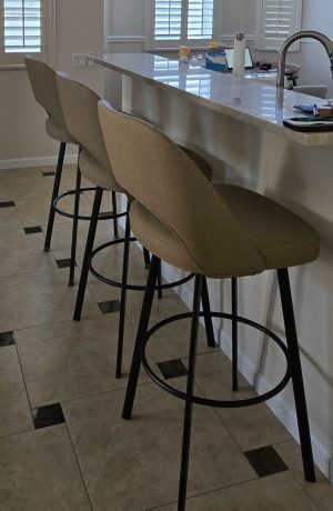 Amisco's Scarlett Brown Swivel Bar Stools in Customer's Kitchen Island