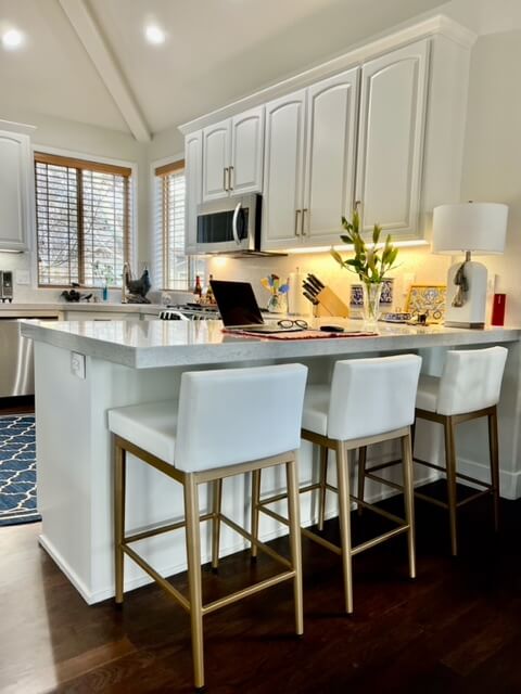 Hanson modern gold and white bar stools in kitchen