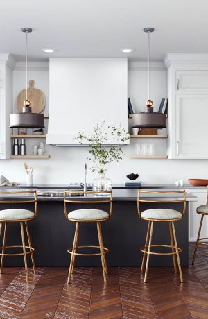 Wesley Allen's Ryo Hammered Swivel Bar Stools with Low Back in Modern Kitchen