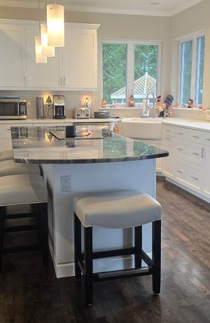 Style Upholstering's 680 Black Wood Backless Bar Stools with White Seat Cushion in Customer's White and Black Modern Kitchen