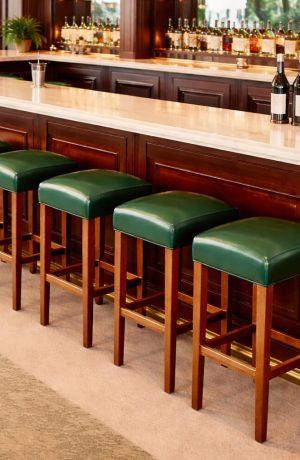 Style Upholstering's 696B Green Backless Bar Stools in Restaurant Bar - Close Up