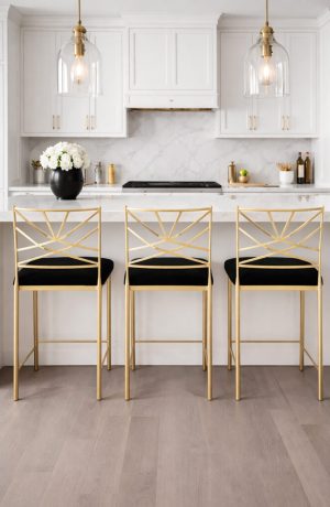 Wesley Allen's Clair Modern Gold Bar Stools in Black, White, and Gold Kitchen
