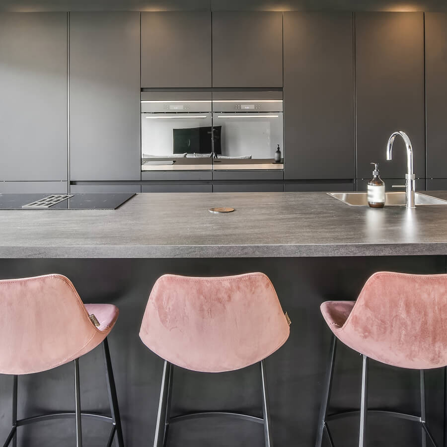 Modern Kitchen with Pink Bar Stools