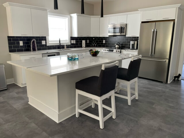 Style Upholstering's 6622-SSB White Wood Bar Stools with Black Fabric in Modern Kitchen