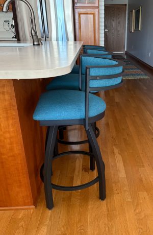 Holland's Artemis Black Swivel Bar Stool in Teal Blue in Customer's Kitchen