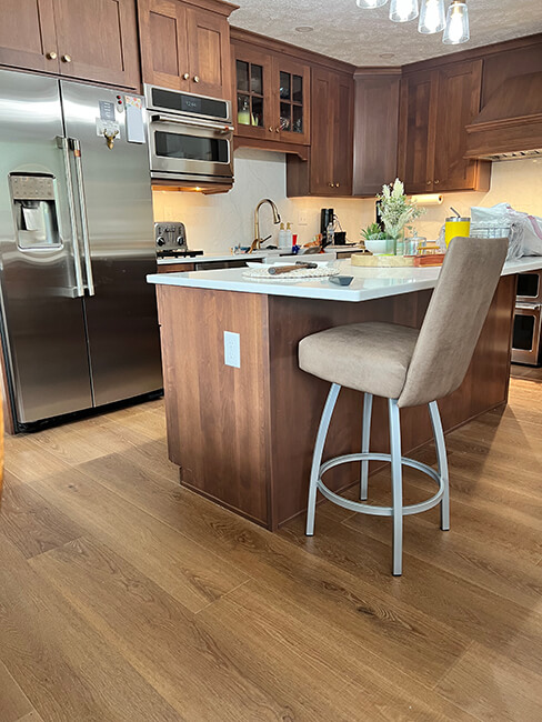 Trica's Nicholas Silver Swivel Bar Stool with Customer's Kitchen
