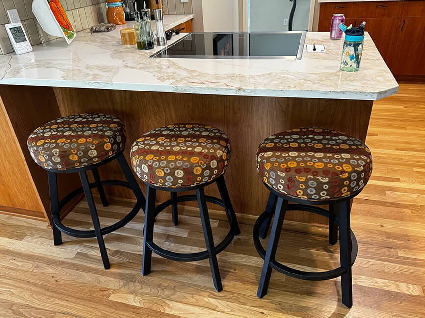 Wesley Allen's Miramar Backless Swivel Bar Stools in COM - In Customer's Kitchen